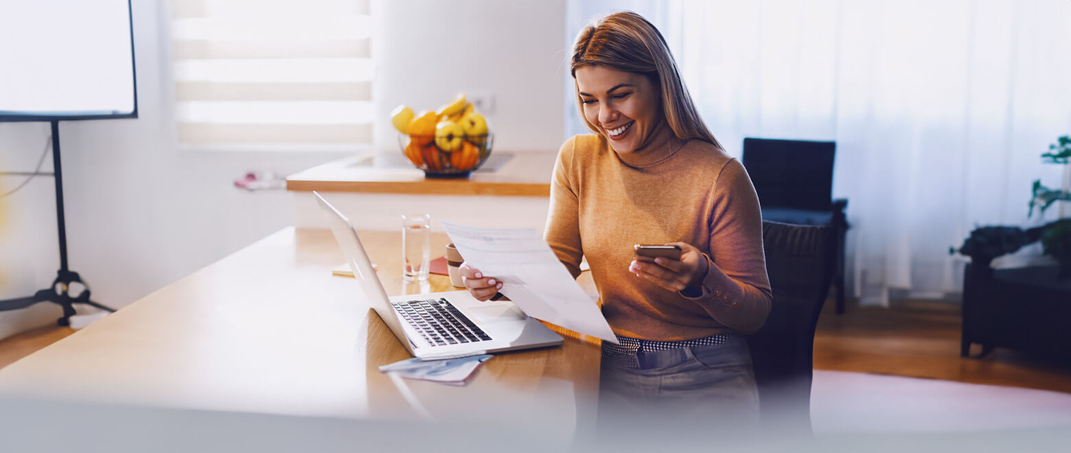 Woman Paying Bills with Bill Pay