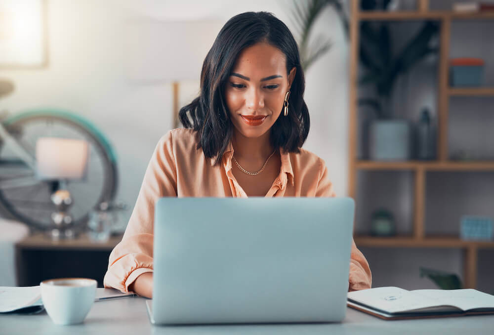 woman opening a checking account online with United Community